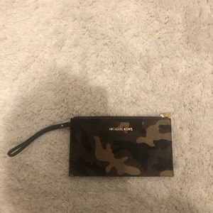 Michael Kors  .  Brown, tan and black.  Like new camouflage